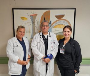 West Gables’ Marilyn Fernandez, director of nursing, and Robert Castro, physician assistant, with AccentCare’s Maydelin Navarro, nurse practitioner